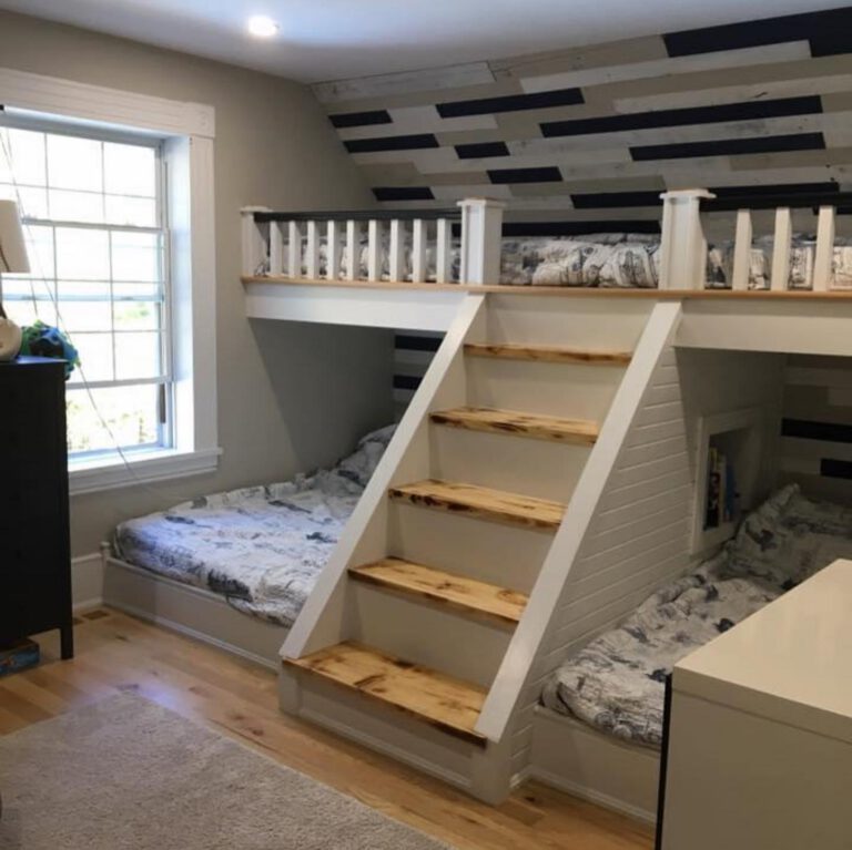Kids' bedroom with built-in bunk beds, wooden stairs and a plank feature wall